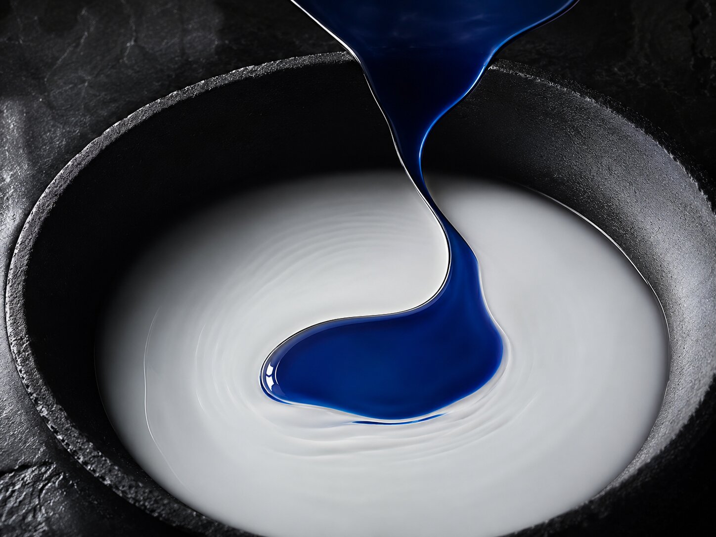 Abstract realistic liquid and light scene suggesting synthetic brand imagery becoming believable