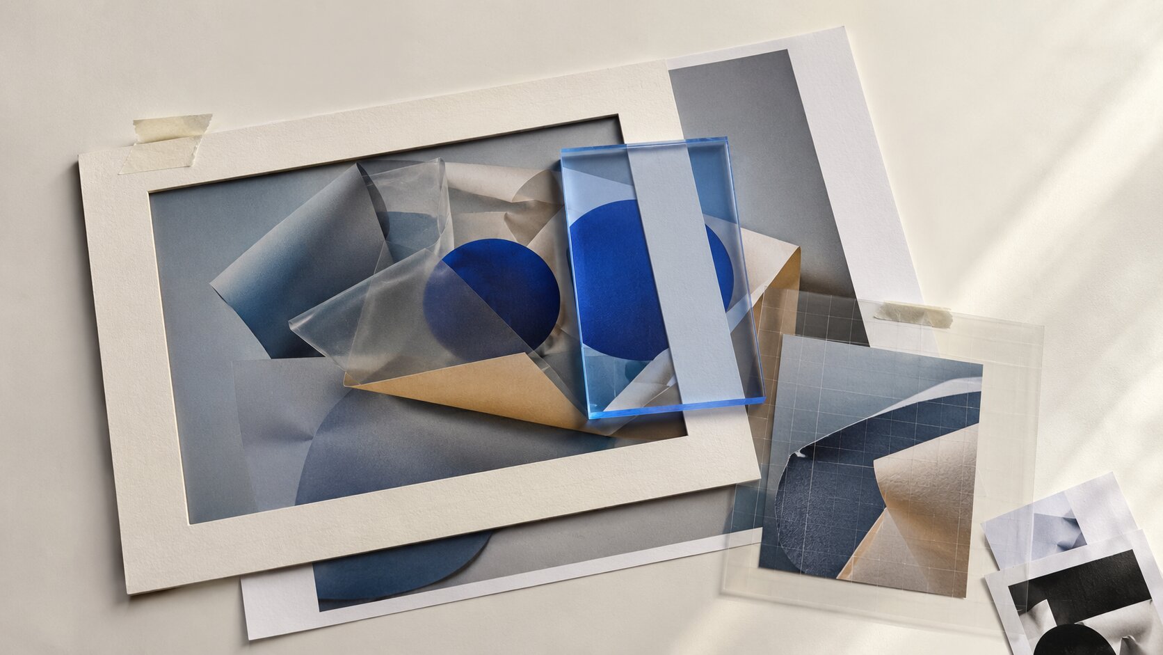 A single photographic print is viewed through several differently shaped translucent framing masks, each revealing a different part of the same underlying image.